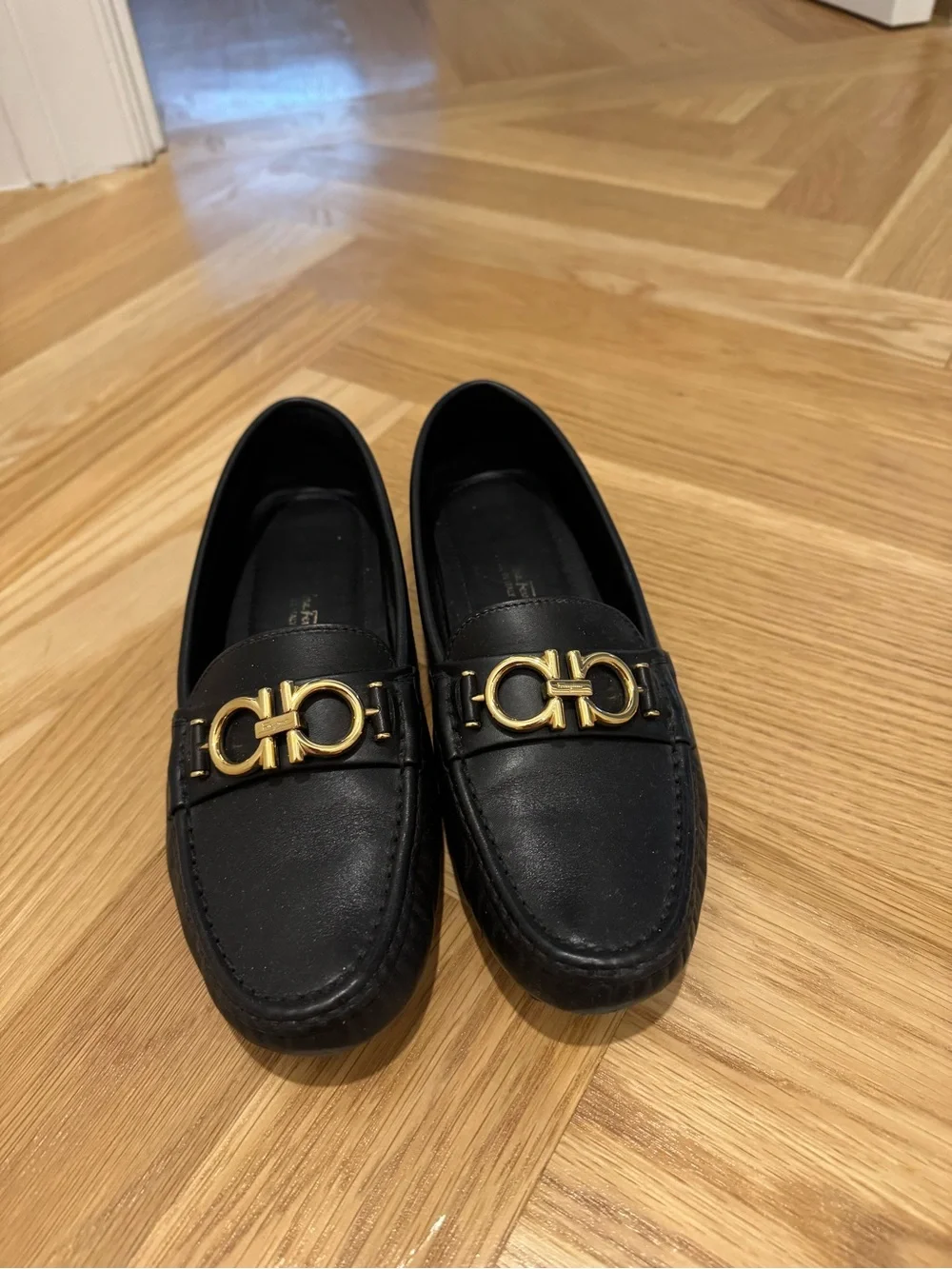 Salvatore Ferragamo Berra Black Leather Women’s Loafers with Gold Hardware